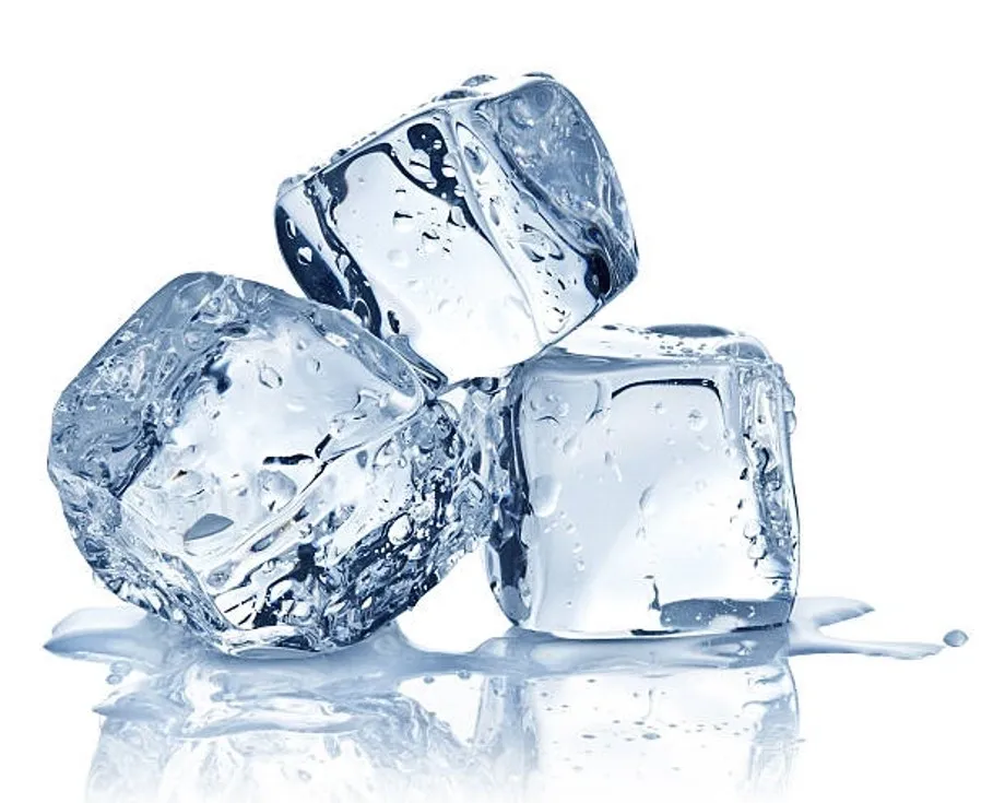 Three ice cubes sitting on top of each other.